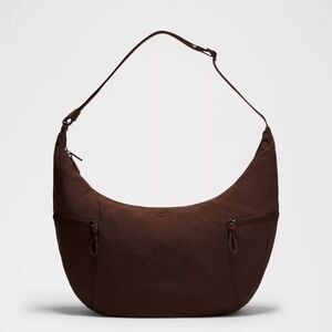 Lululemon Large Slouchy Sling bag in the 13L size.